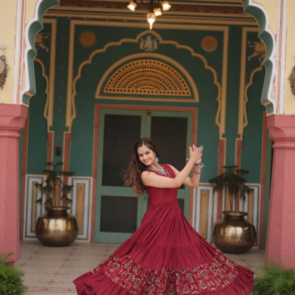 Maroon Designer Heavy Reyon Gown with Printed Frill & Fancy V-Neck